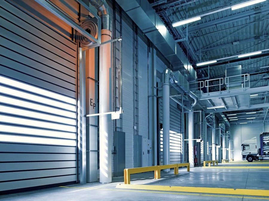 Modern warehouse interior with a delivery vehicle loading