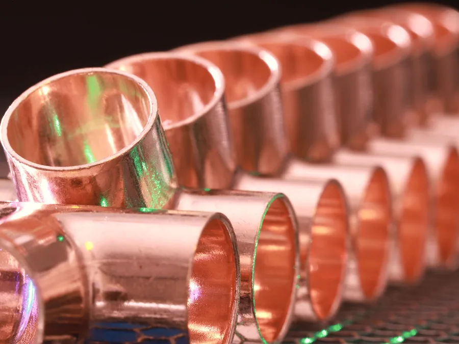 Row of copper pipe couplings