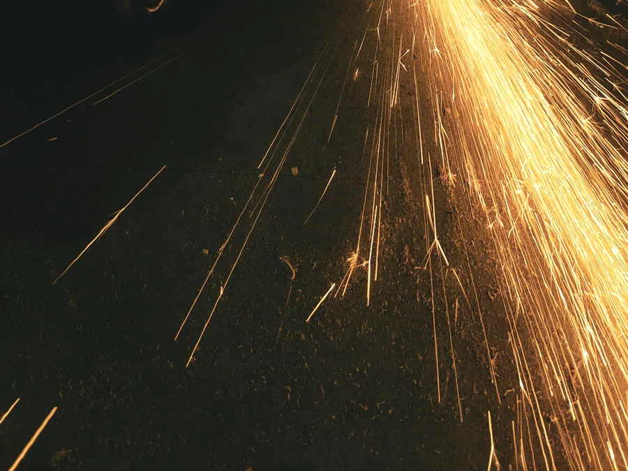 Cutting disc throwing a spray of sparks
