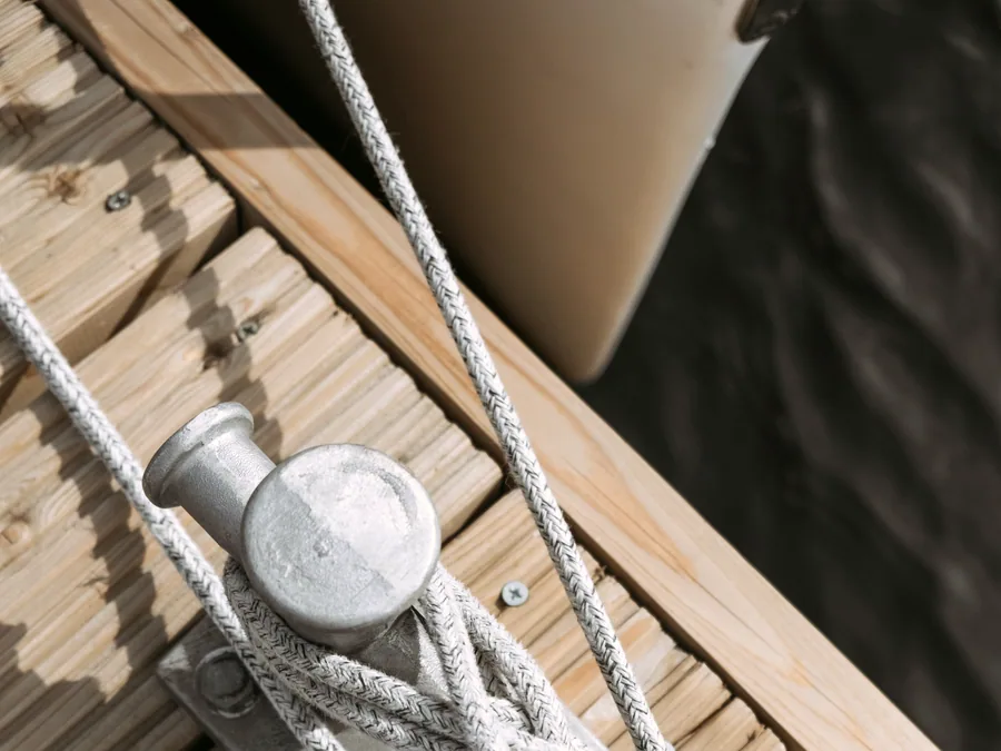 Mooring cleat and lines on a marina pontoon