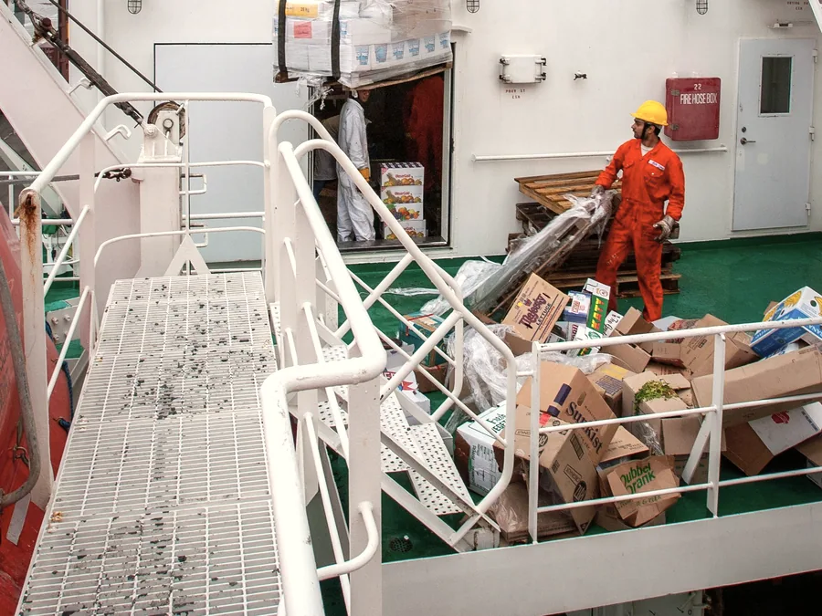 Stores lifted aboard a vessel by crane
